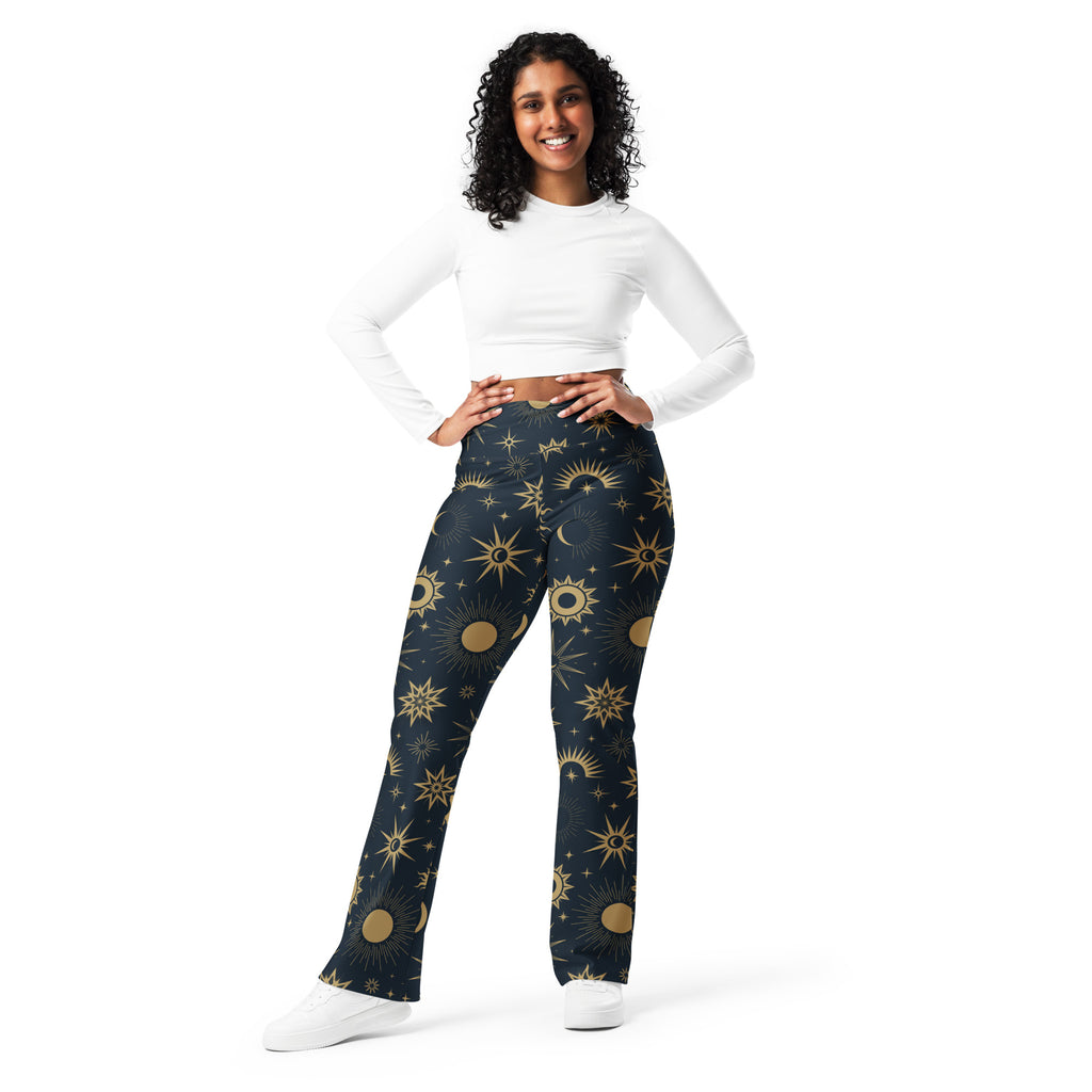 Dark blue high waist flare legging pants with gold celestial sun moon and star pattern for women
