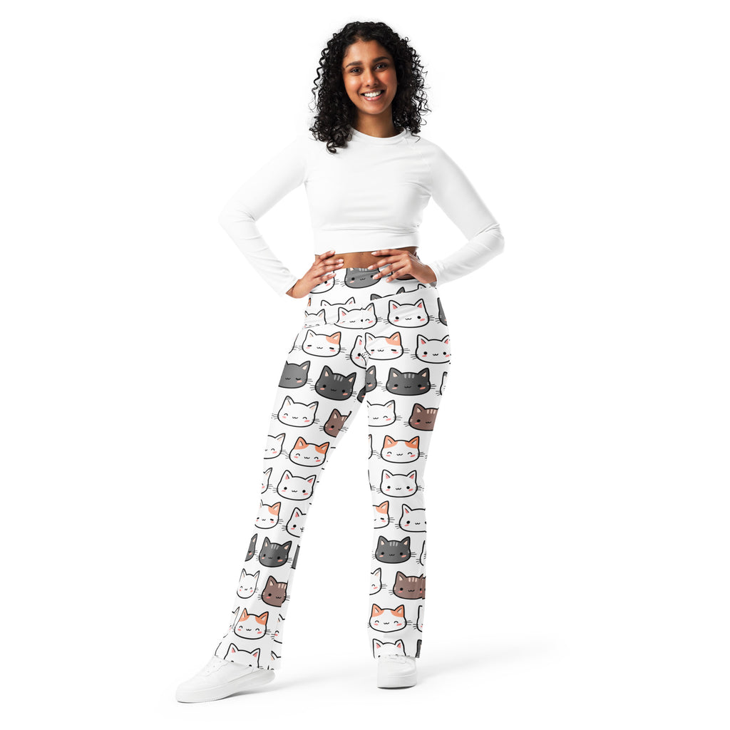 White women’s high waist flare leggings with playful gray black and orange cartoon cat print pattern