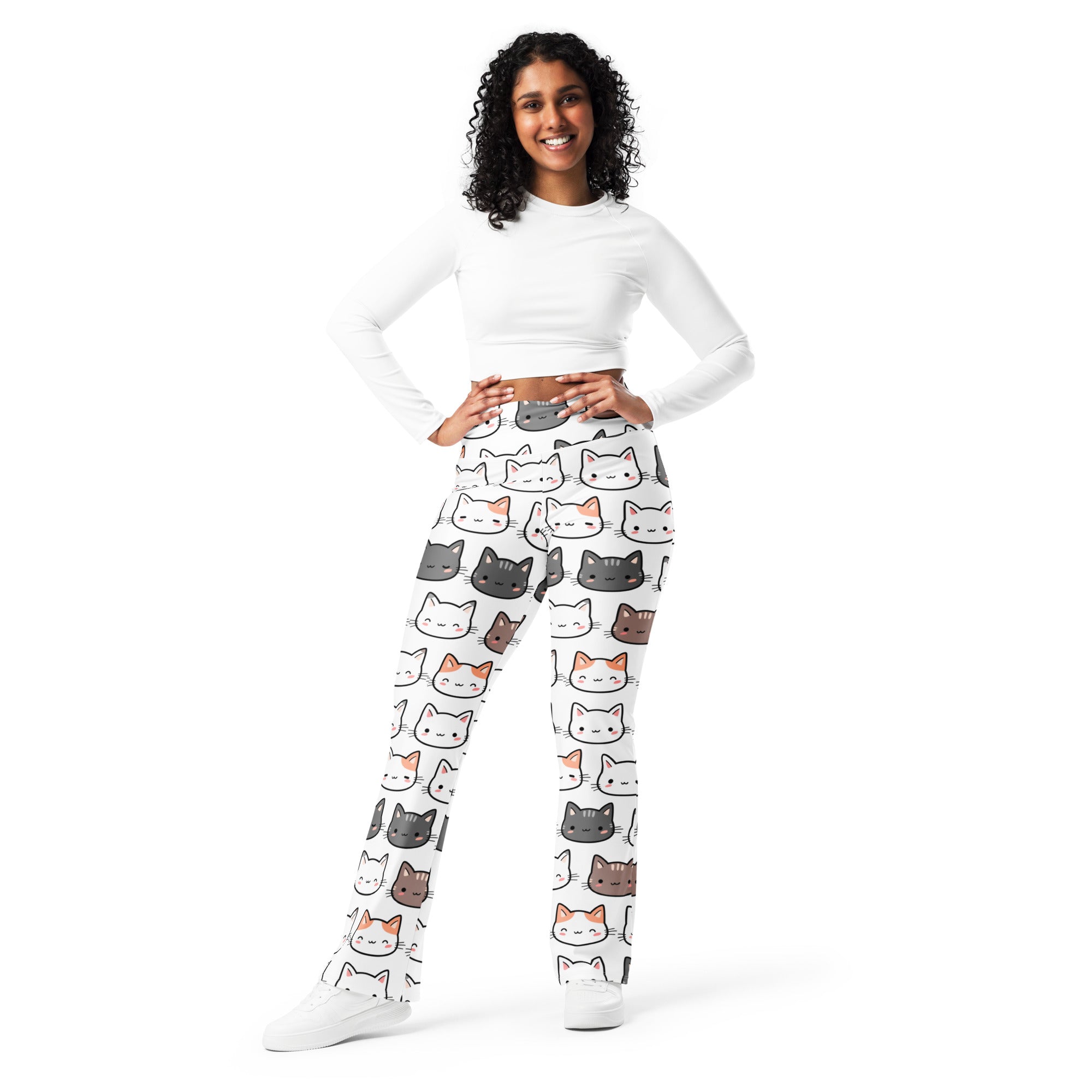 White women’s high waist flare leggings with playful gray black and orange cartoon cat print pattern