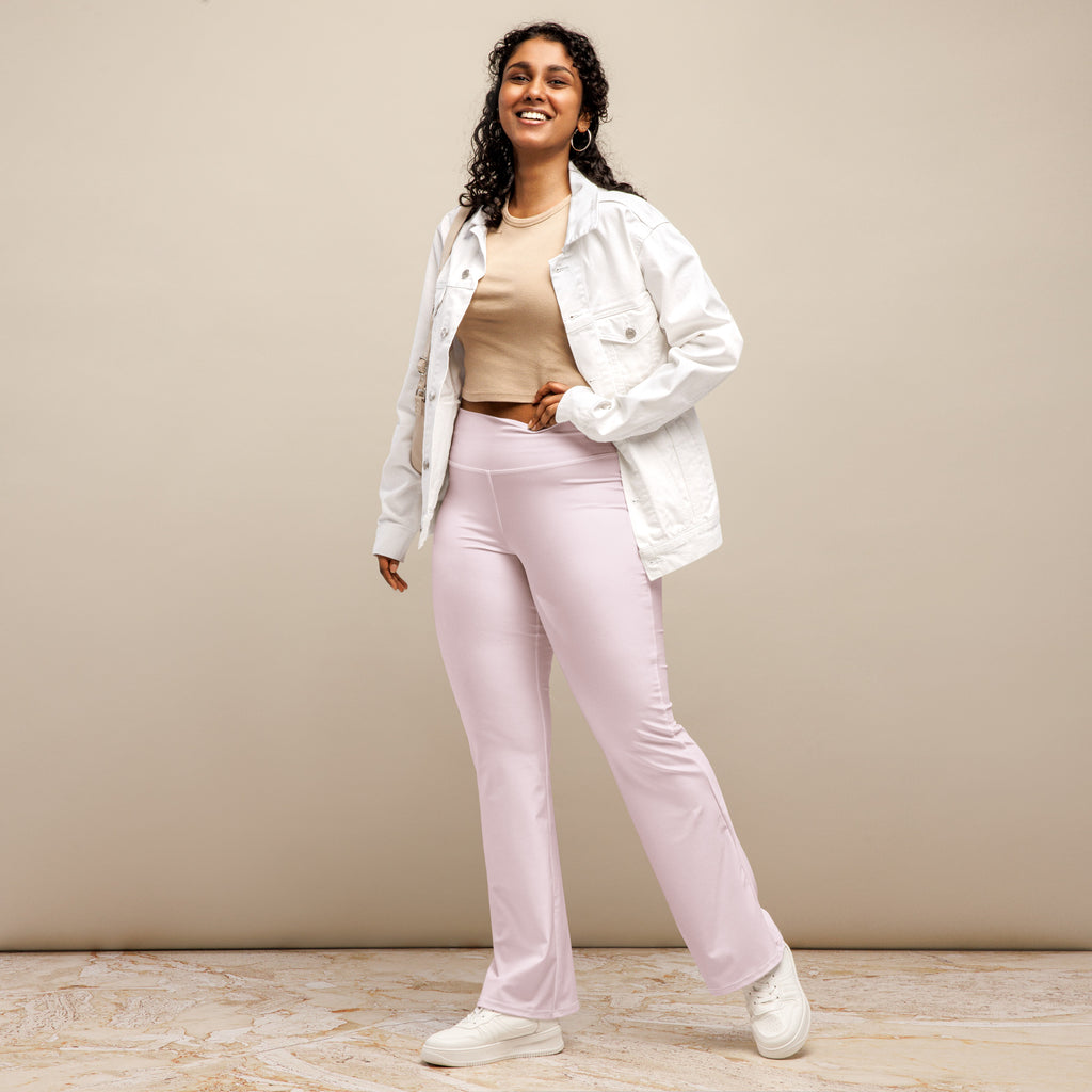 Women’s light pink high waist flare legging pants made of soft stretchy fabric for casual and stylish wear