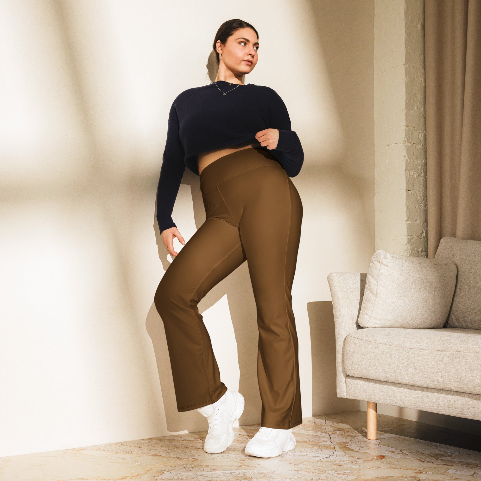 Women’s brown high waist flare legging pants made from stretchy fabric for a stylish and comfortable fit