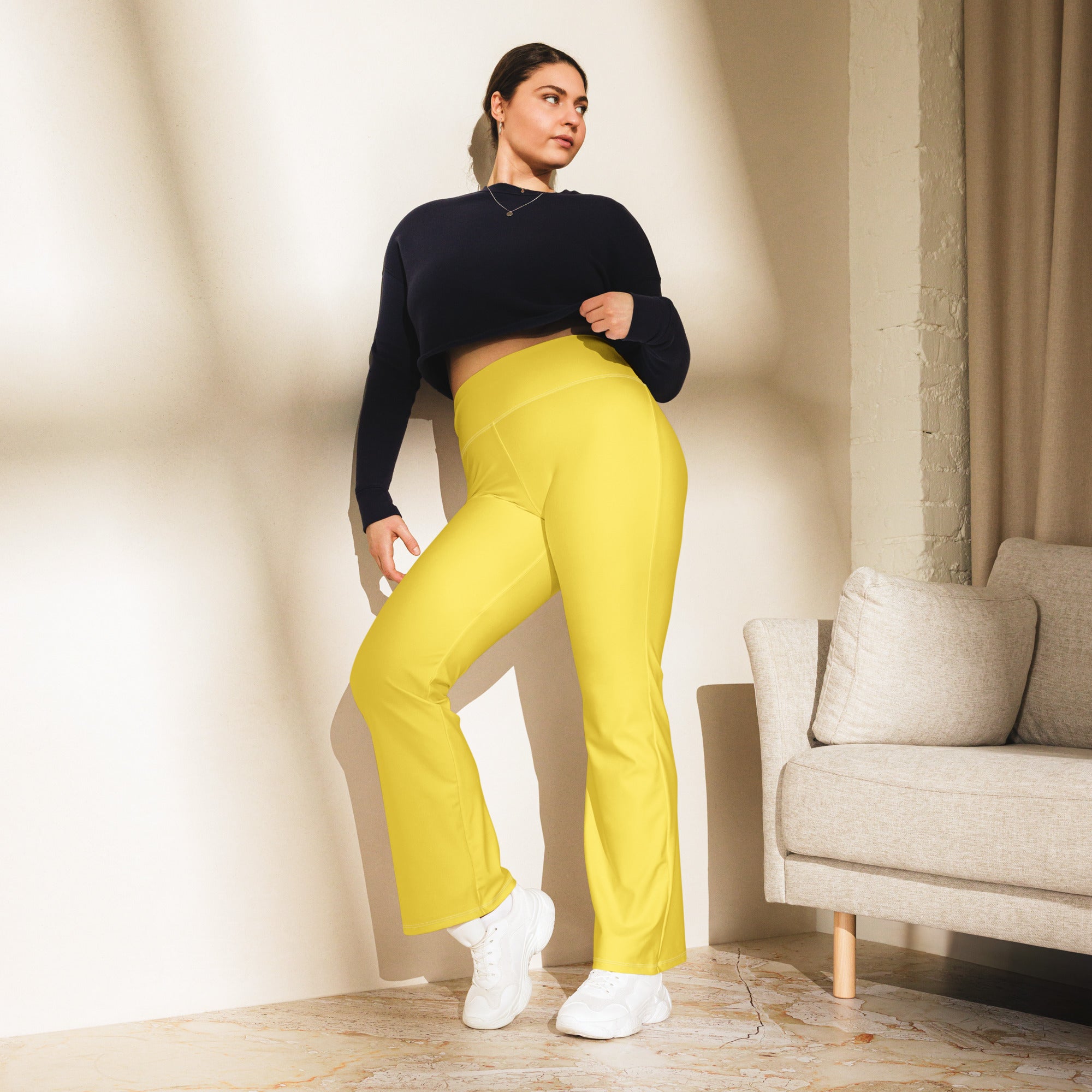 Women’s yellow high waist flare legging pants made of bright stretchy fabric perfect for casual or dressy wear