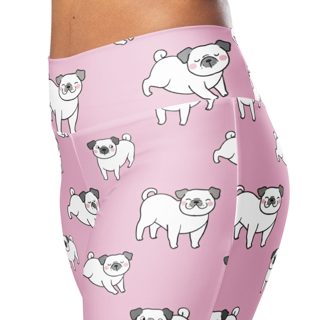 Women’s pink high waist flare leggings with playful white cartoon pug pattern and black ears and noses