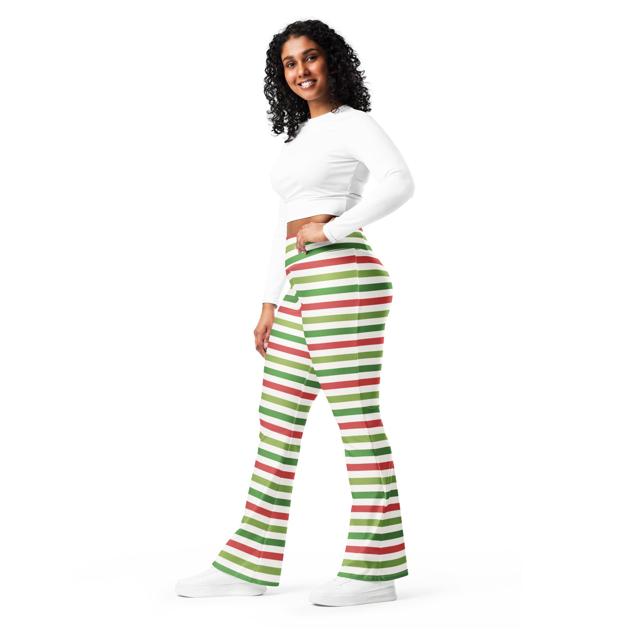 Women’s yellow high waist flare legging pants with red and green horizontal stripes and a flared fit