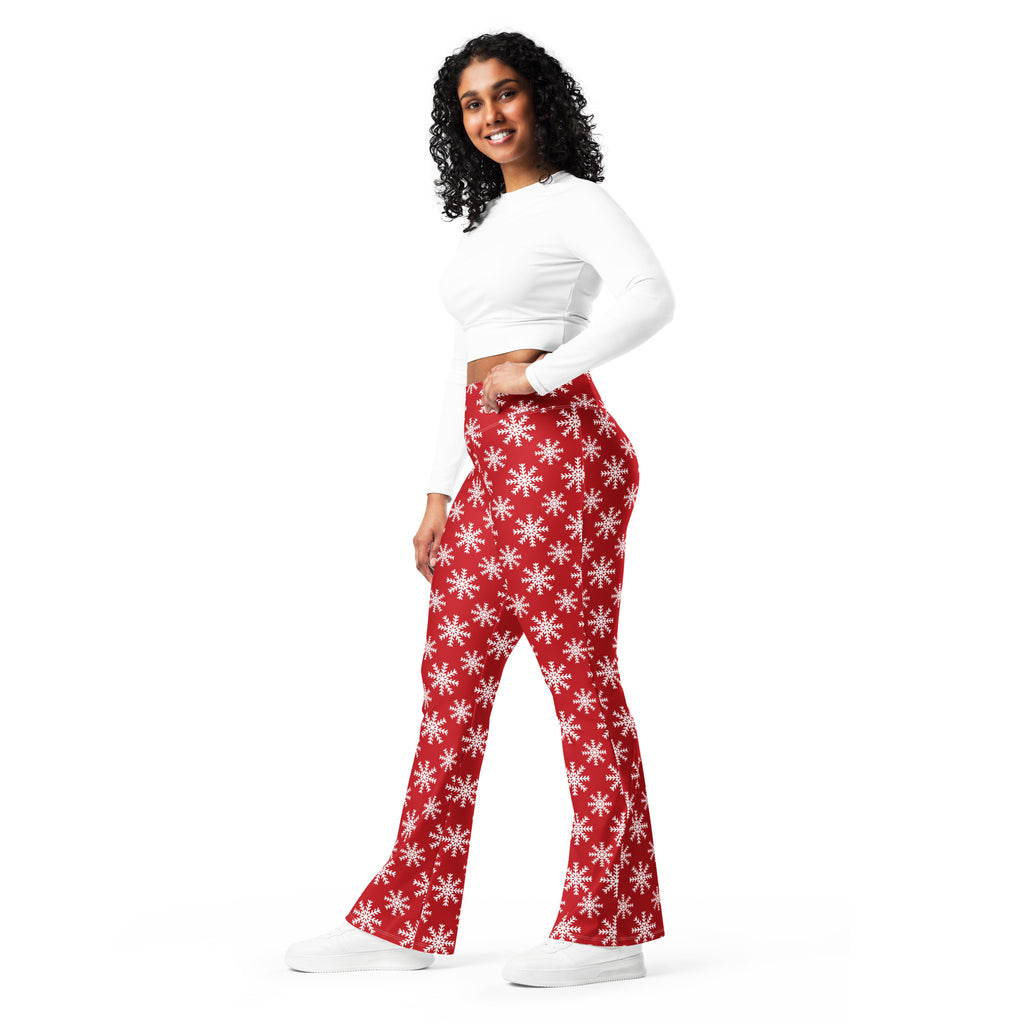 Women’s red snowflake high waist flare legging pants with white snowflake pattern and flared design