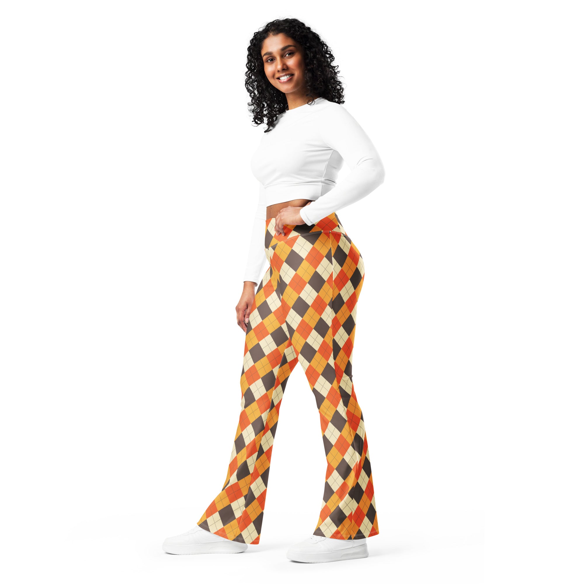 Women’s fall argyle high waist flare legging pants with vibrant orange brown and cream argyle pattern