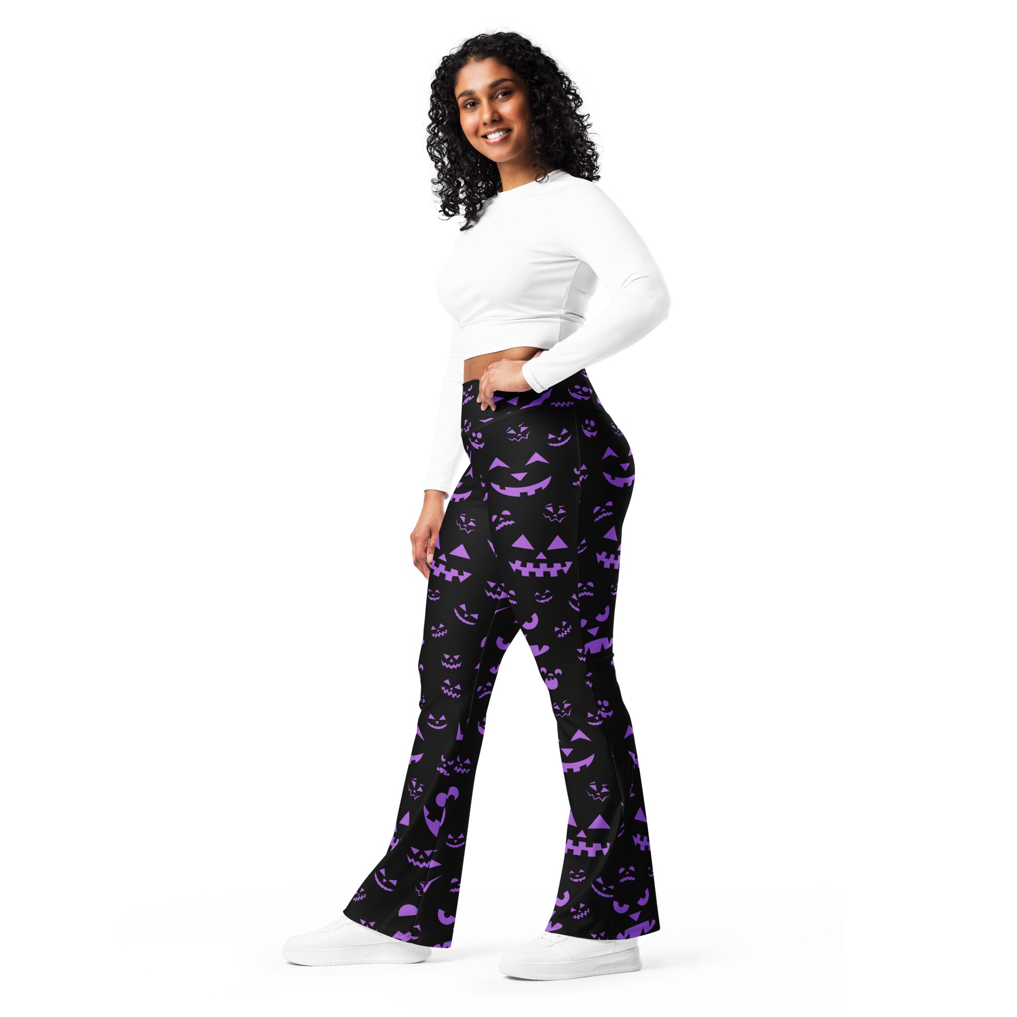 Women’s black flared pants with vibrant purple jack-o-lantern pattern high waist halloween leggings