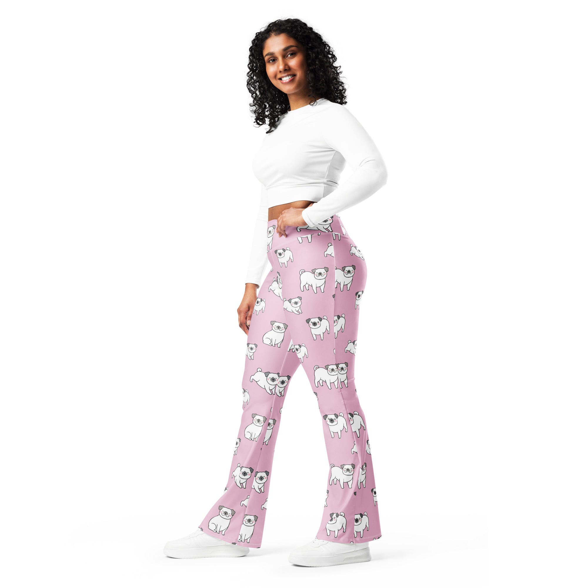 Women’s pink high waist flare legging pants with a playful white pug dog pattern