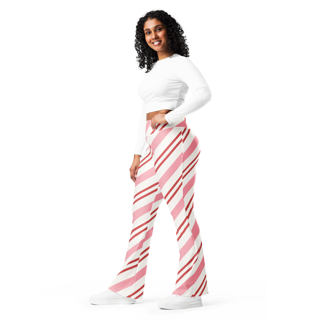 Women’s pink candy cane stripes high waist flare legging pants with diagonal pink and white stripes