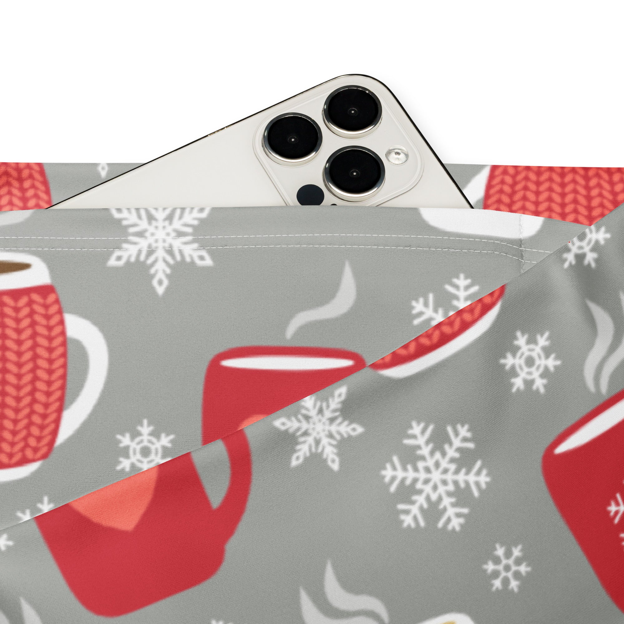 Gray fabric phone pouch with festive red knitted mugs and white snowflakes pattern for women’s hot cocoa Christmas leggings