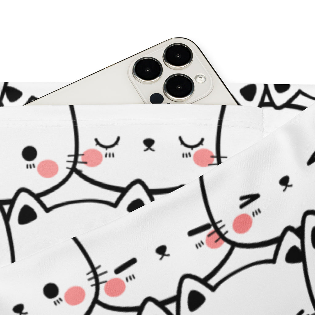 White phone case with playful cartoon cats pattern featuring black outlines and pink cheeks for women