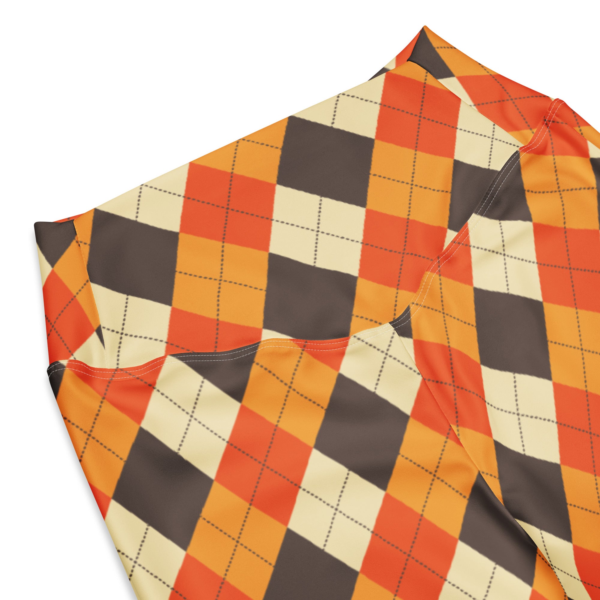 Women’s fall argyle high waist flare legging pants in vibrant orange cream and dark gray with a dotted grid pattern
