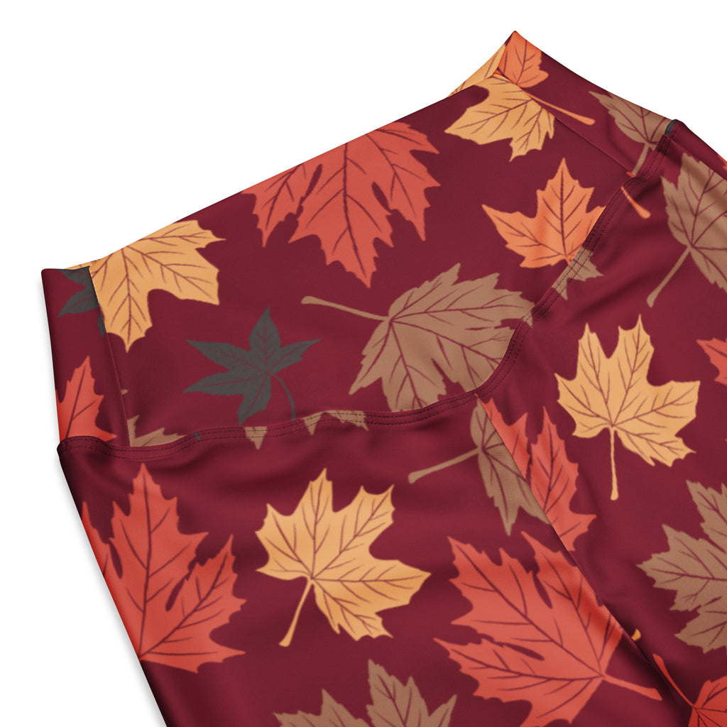 Women’s autumn leaves high waist flare leggings in maroon with vibrant orange yellow and brown leaf pattern