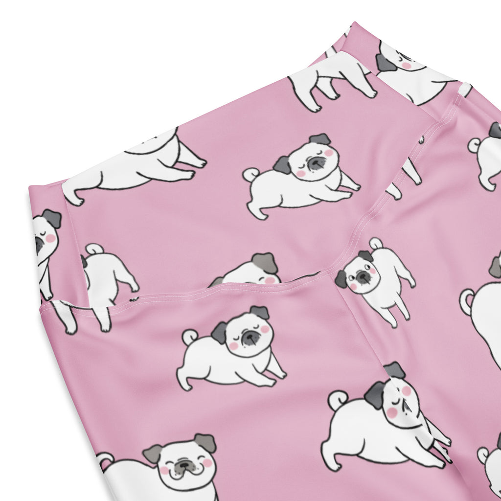 Women’s pink high waist flare legging pants with repeating white and gray cartoon pug dog pattern on fabric