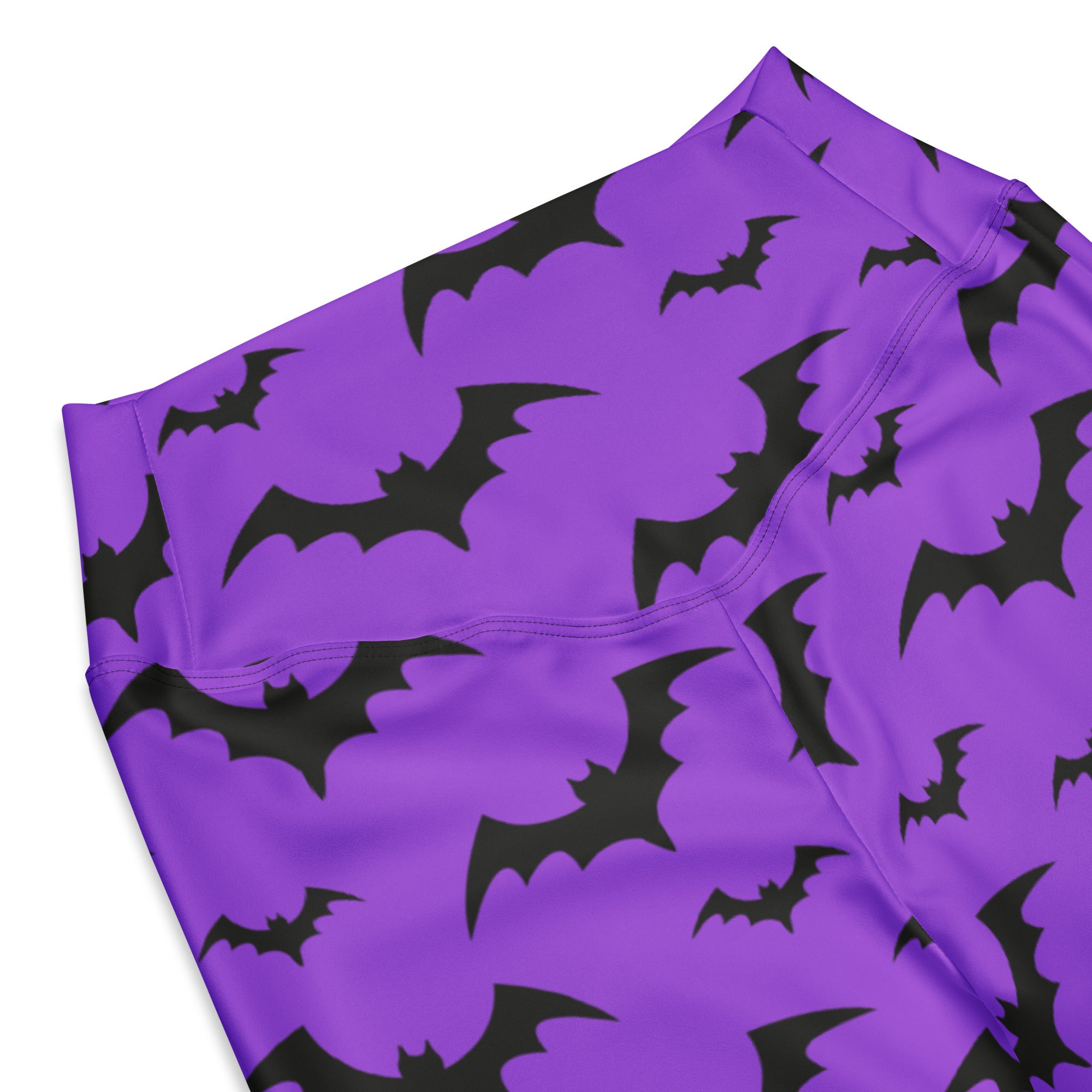 Women’s purple high waist flare leggings with bold black bat pattern perfect for halloween wear