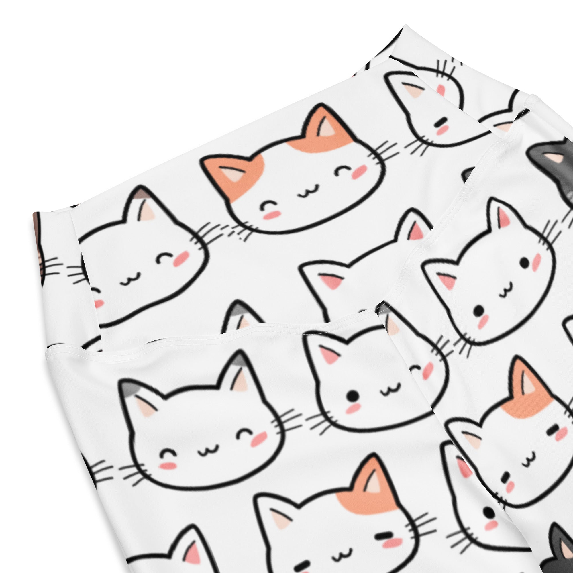 White women’s high waist flare leggings with playful cartoon cat faces in black orange and pink print