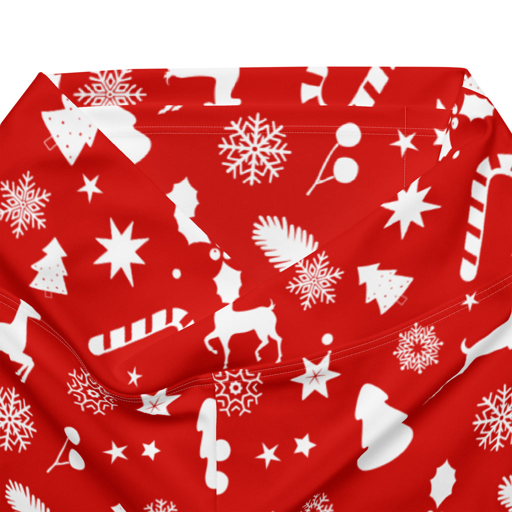 Women’s red high waist flare leggings with white christmas print featuring snowflakes reindeer candy canes and stars