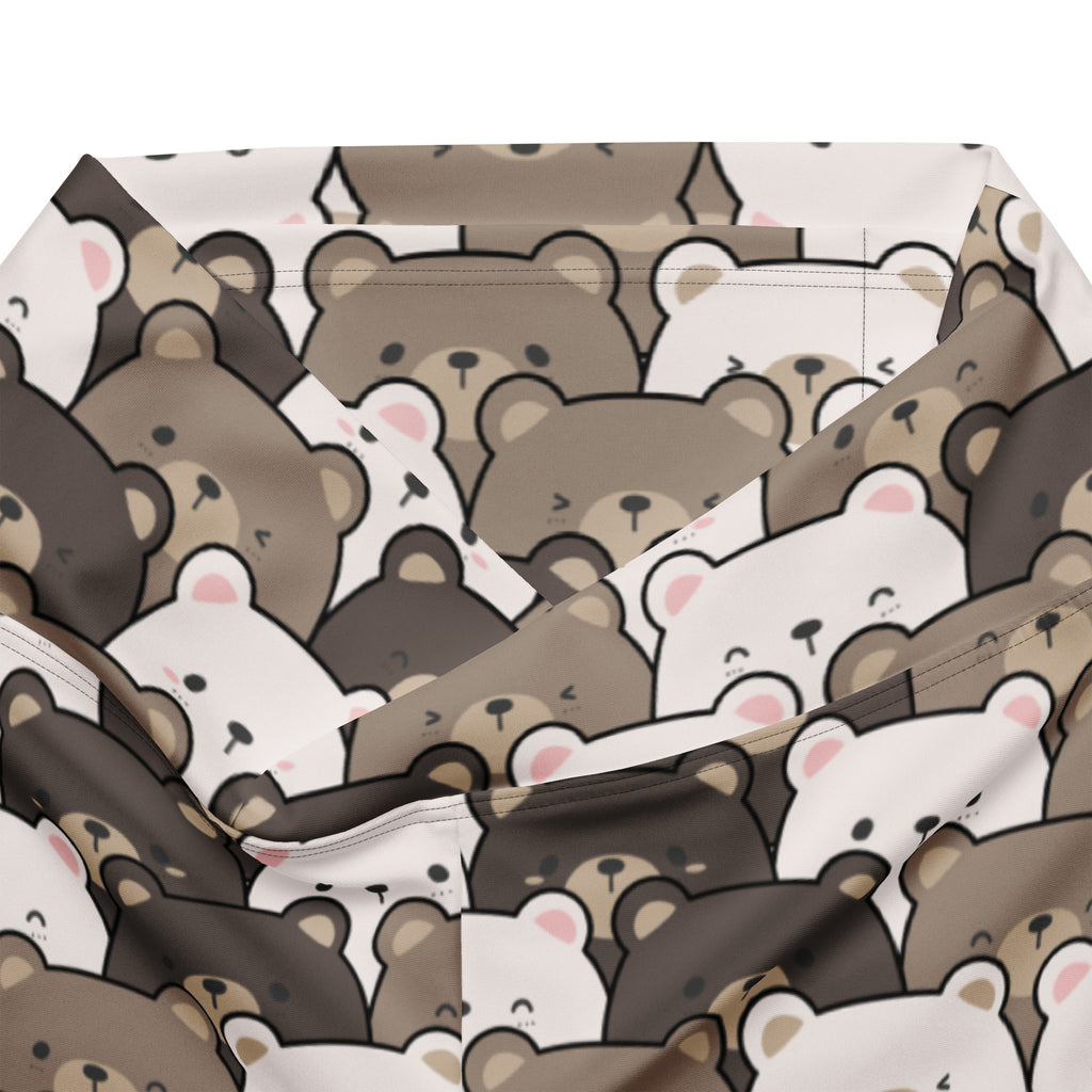 A soft fabric-lined storage bin with a playful pattern of cartoon bears in brown and white for organizing items
