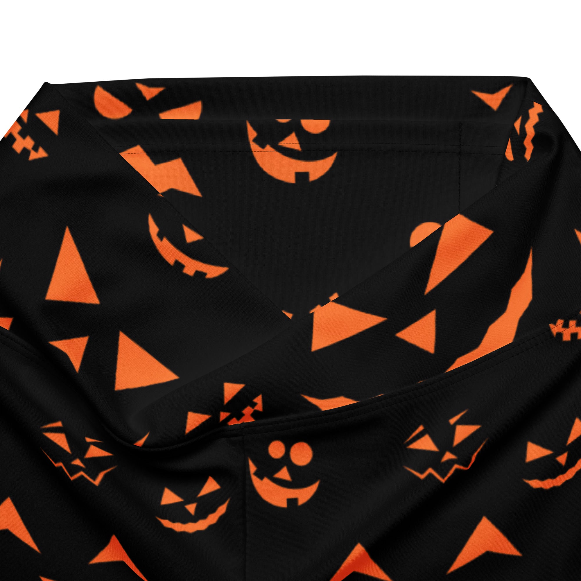 Black fabric with orange jack o lantern faces on womens orange jack o lantern halloween high waist flare legging pants