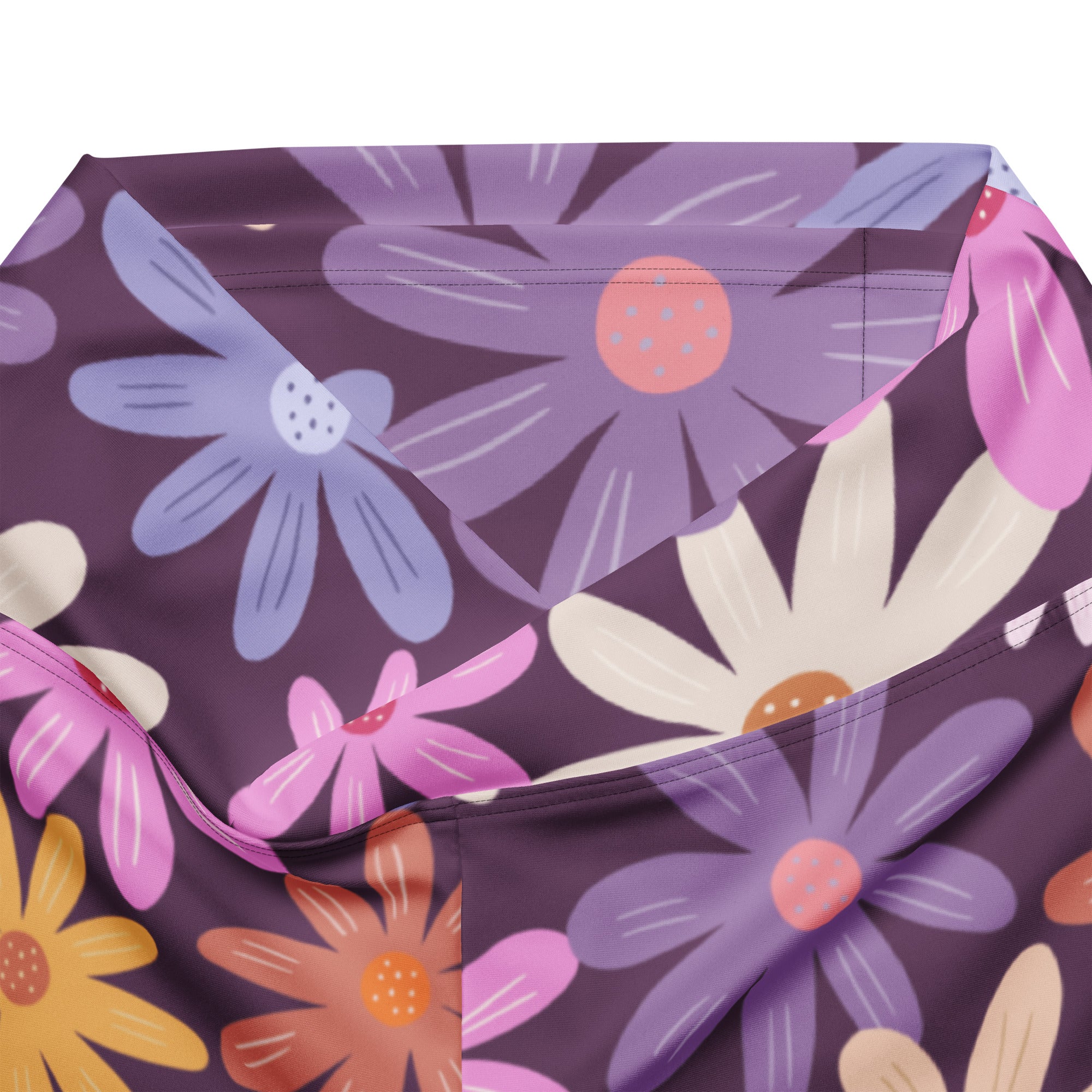 Women’s retro purple daisy high waist flare legging pants with purple floral patterned fabric and stylized pink daisies