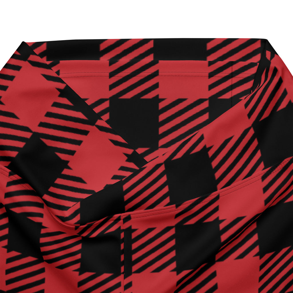 Women’s red buffalo plaid high waist flare legging pants with red and black plaid fabric and bold diagonal checkered pattern