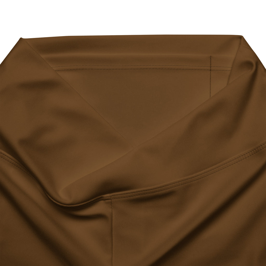 Women’s brown high waist flare legging pants in satin fabric with smooth glossy texture and precise stitching