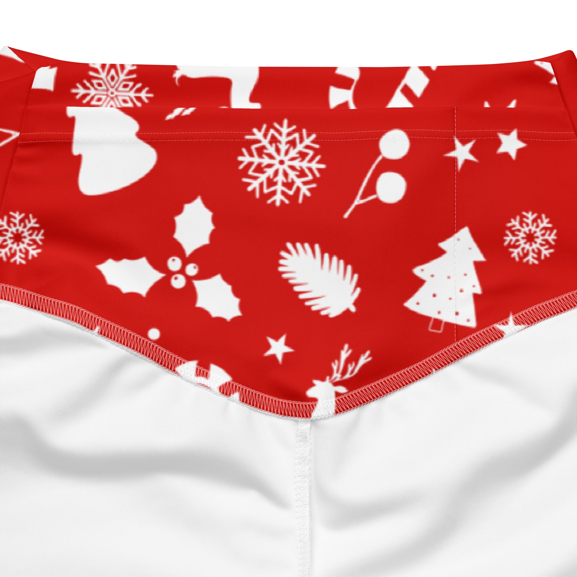 Women’s red christmas print high waist flare legging pants featuring white snowflakes holly pinecones and reindeer designs