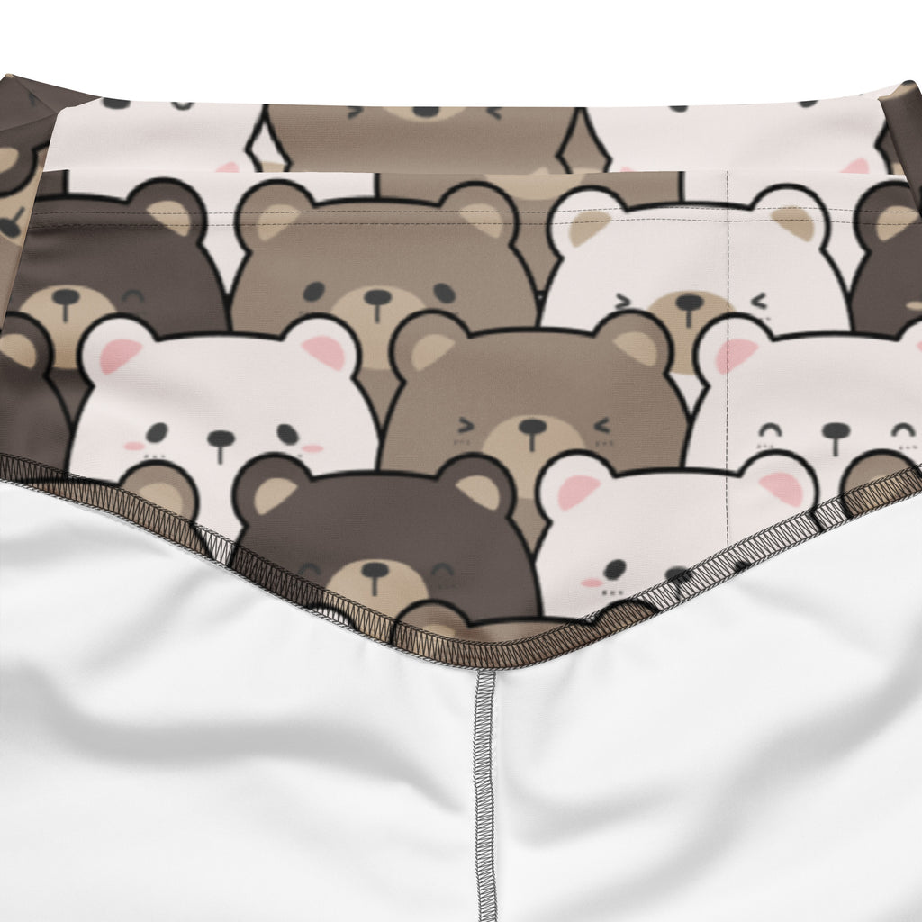 Women’s white high waist flare legging pants with playful brown bear print featuring soft pink ears and black details