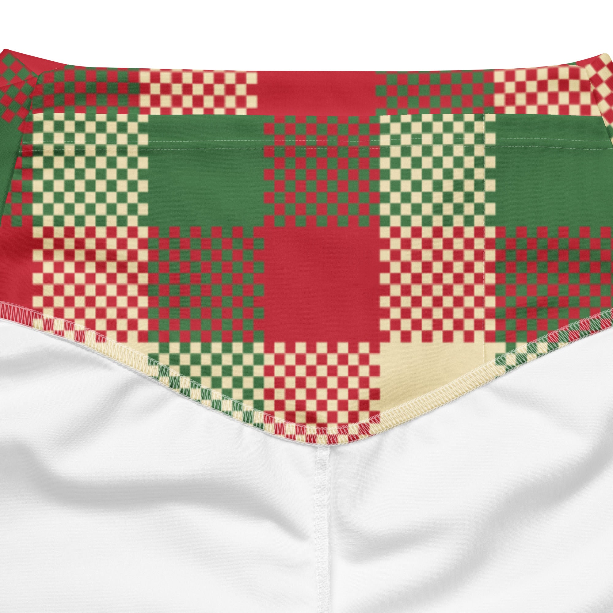 Women’s Christmas plaid high waist flare legging pants in red and green pixelated fabric with cream stitching edge