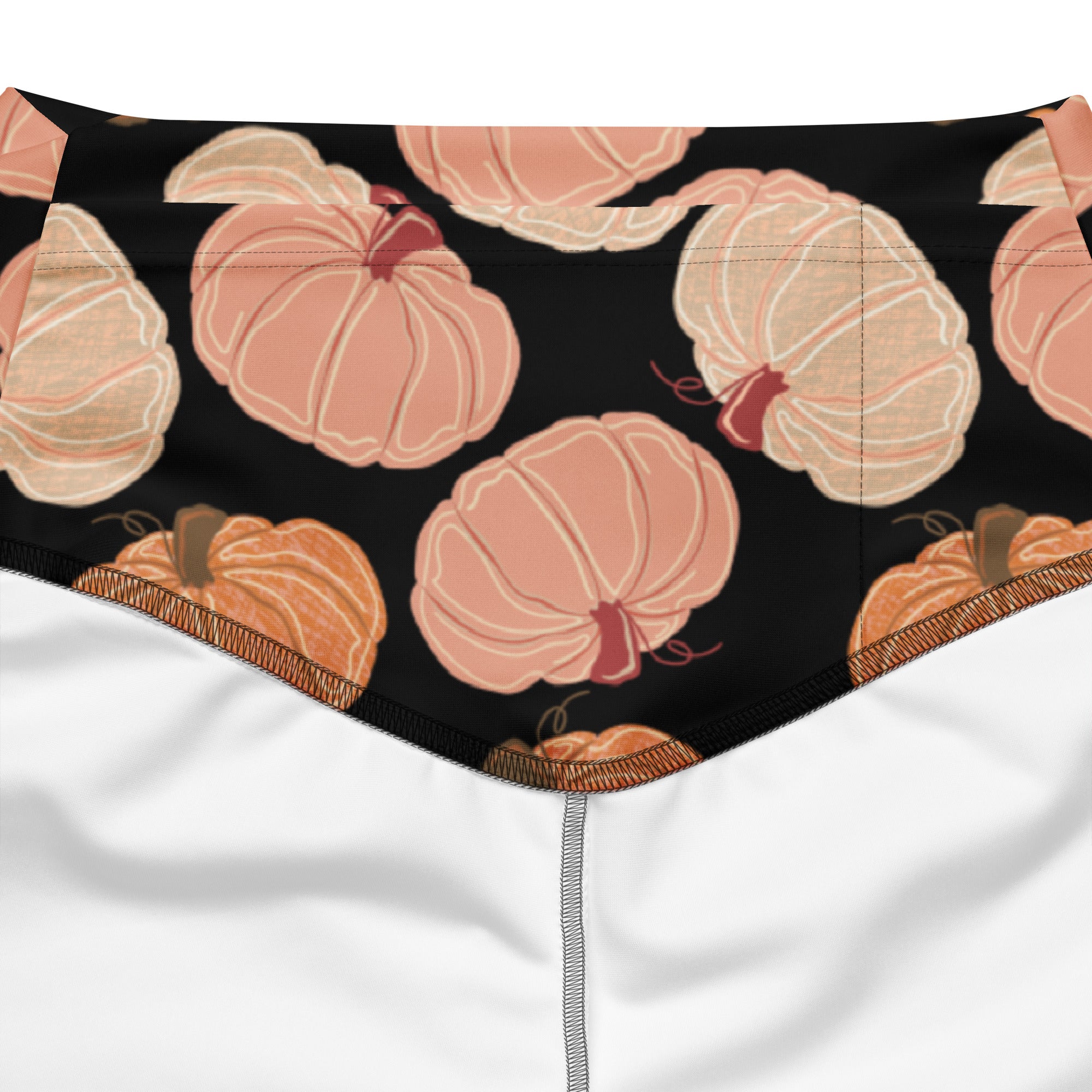 Women’s pumpkin patch high waist flare leggings in black fabric with peach and orange pumpkin pattern and brown stems