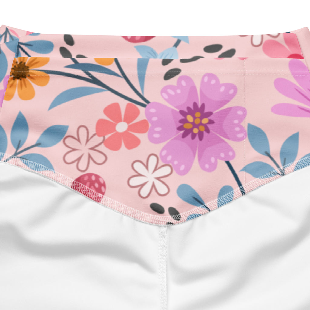 Women’s pink floral high waist flare legging pants with colorful blossom patterned fabric waistband