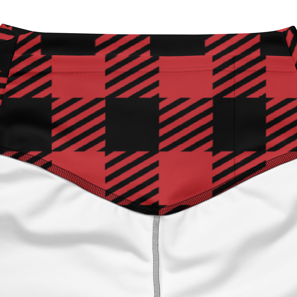 Women’s red buffalo plaid high waist flare legging pants in red and black plaid fabric with diagonal checkered stripes