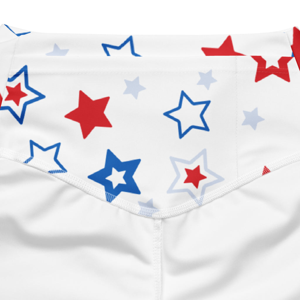 White briefs with a playful pattern of red blue and light gray stars in various sizes for women
