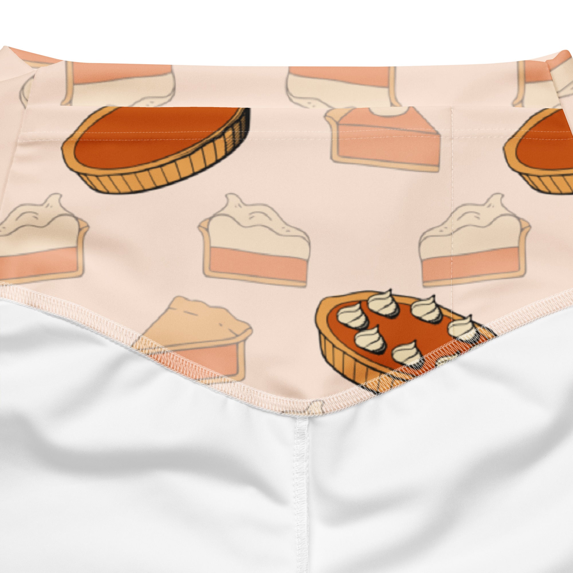 A soft peach-colored bandana with a playful pie pattern complementing women’s pumpkin pie thanksgiving leggings