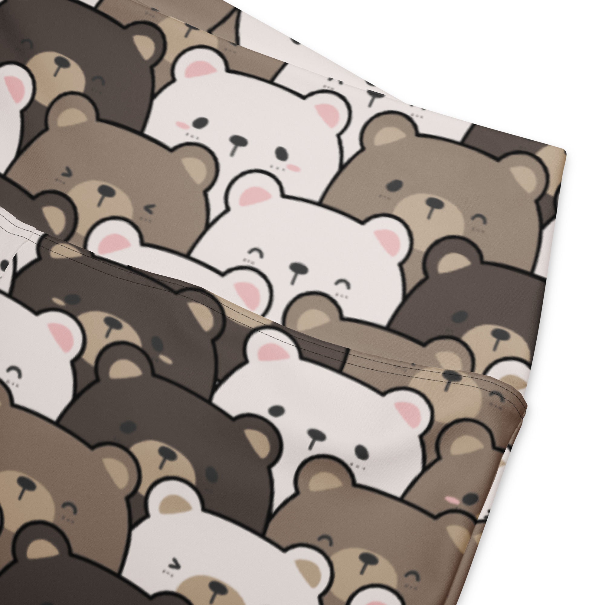 A soft stretchy fabric pouch with a playful pattern of brown and white cartoon bears for women’s cute bear print leggings