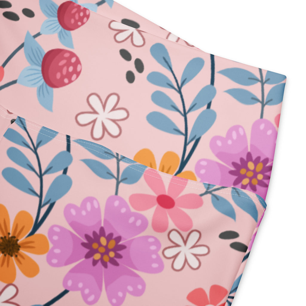 Women’s pink floral high waist flare legging pants with a cheerful fabric pouch featuring purple orange blossoms
