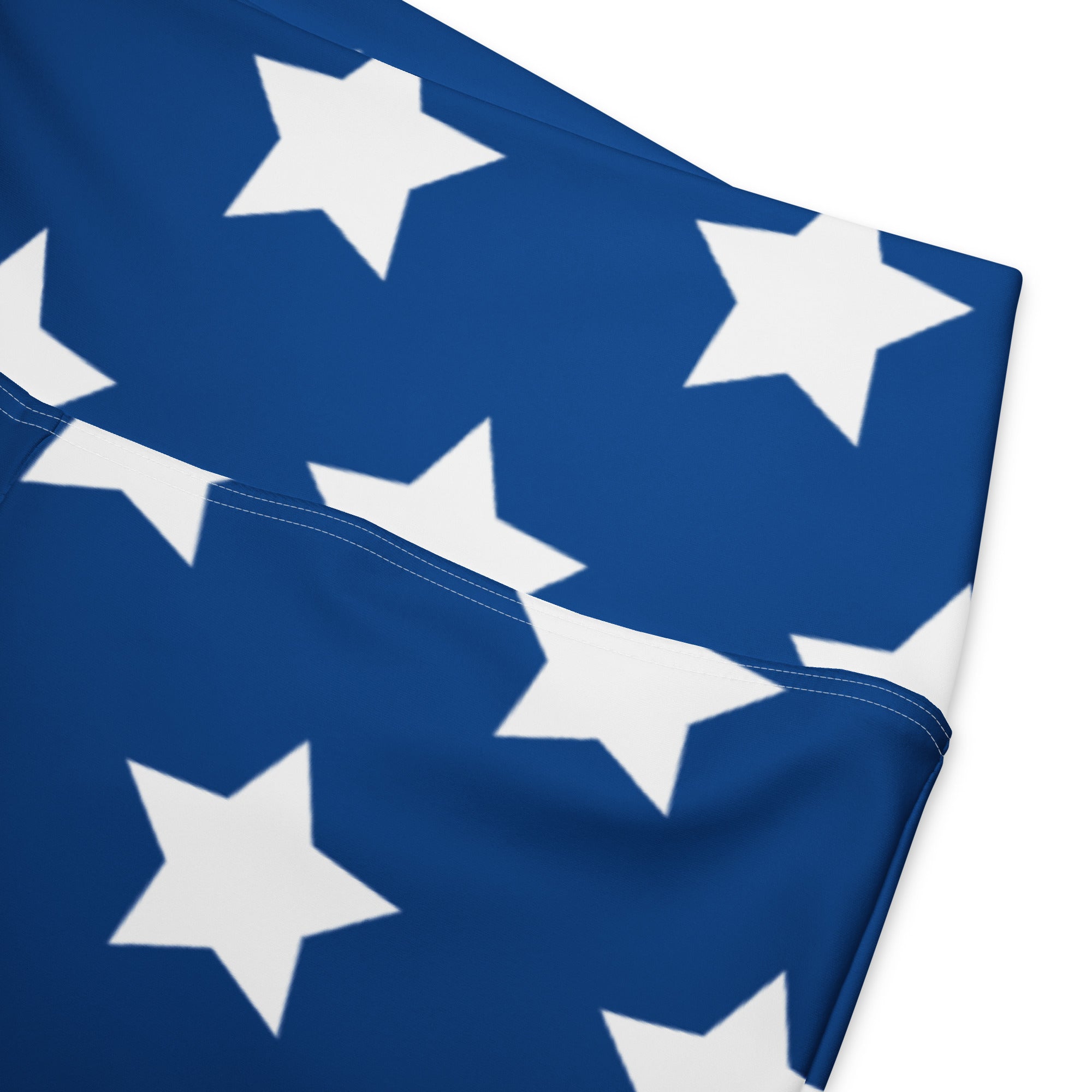Women’s american flag high waist flare legging pants featuring blue fabric with white star print across the surface