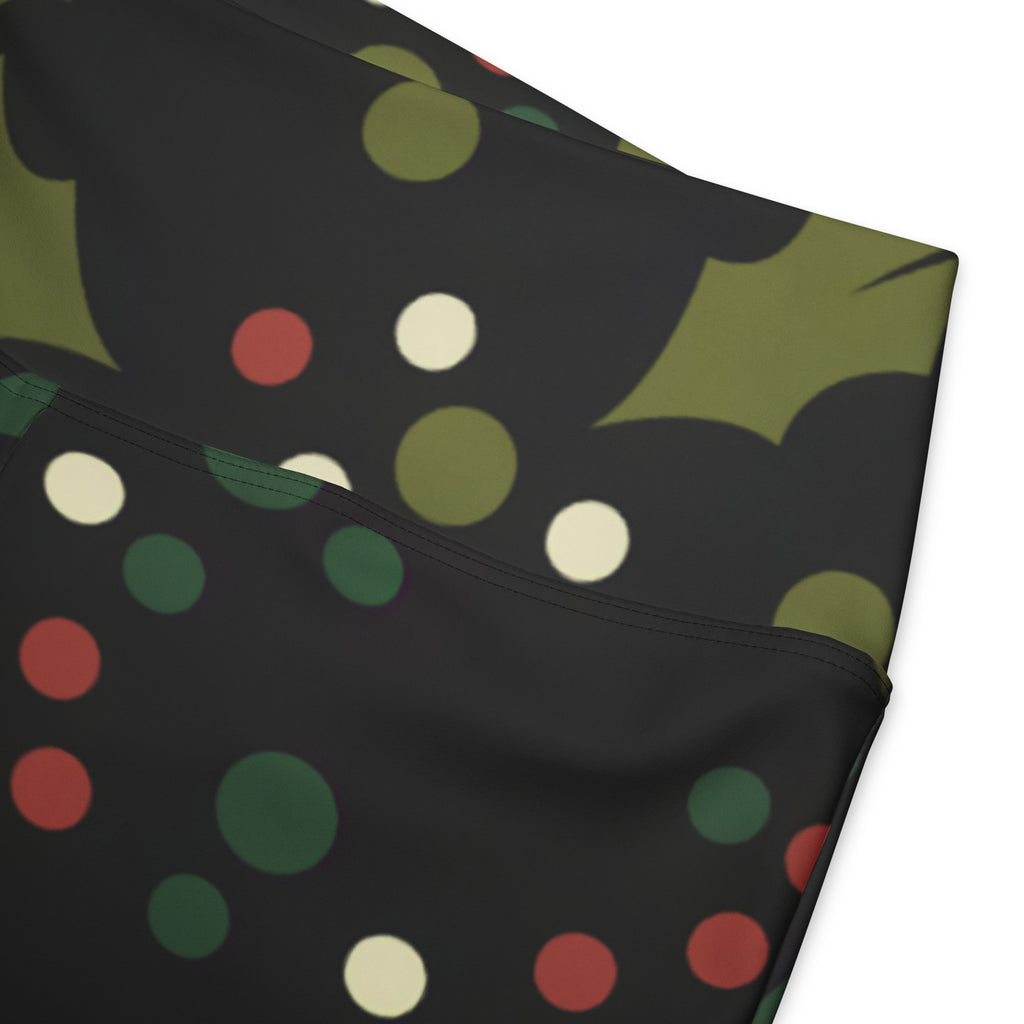 Women’s holly print christmas high waist flare legging pants in black with green holly leaves and red olive cream dots