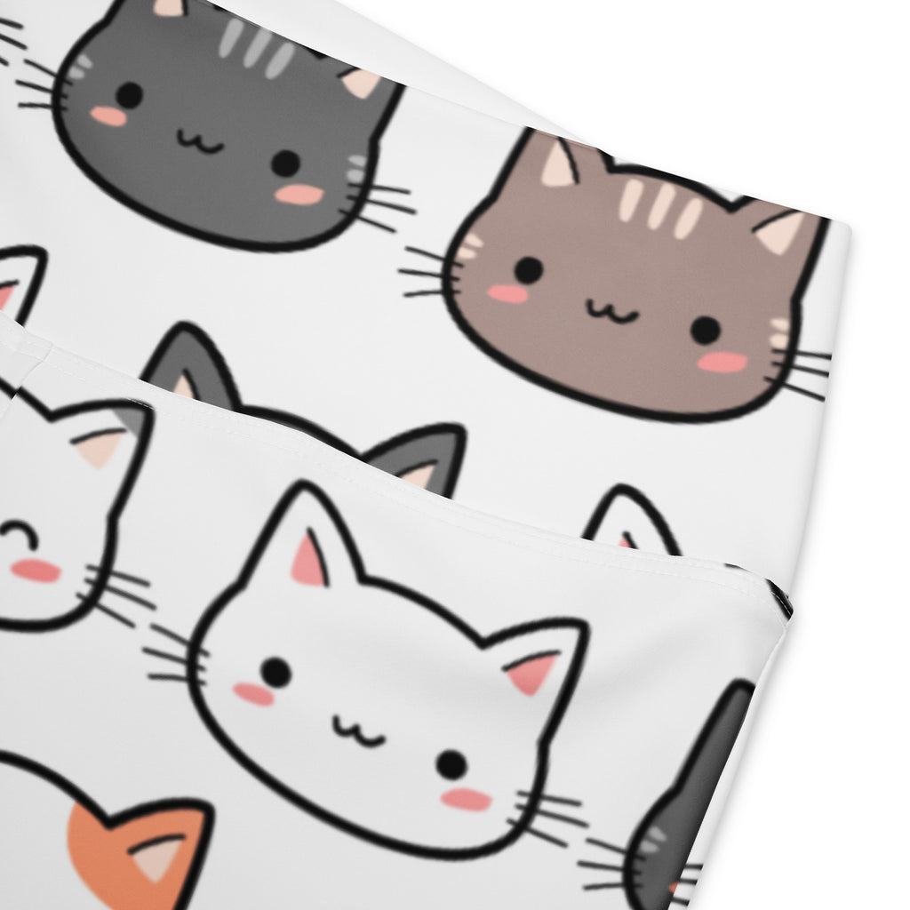 White pillowcase featuring a playful pattern of gray brown and white cartoon cats with pink cheeks and black outlines
