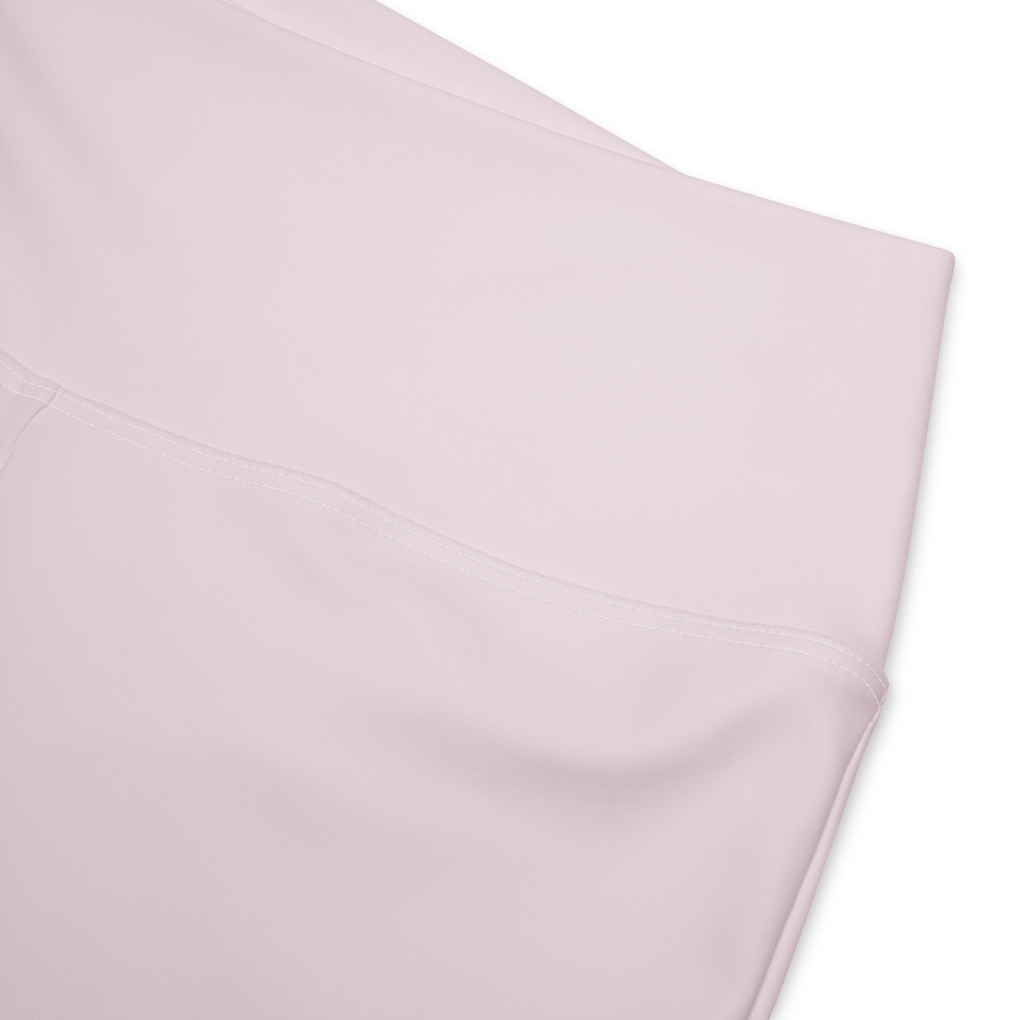 A soft blush pink satin pillowcase with a smooth glossy finish and neatly stitched edges for women’s comfort