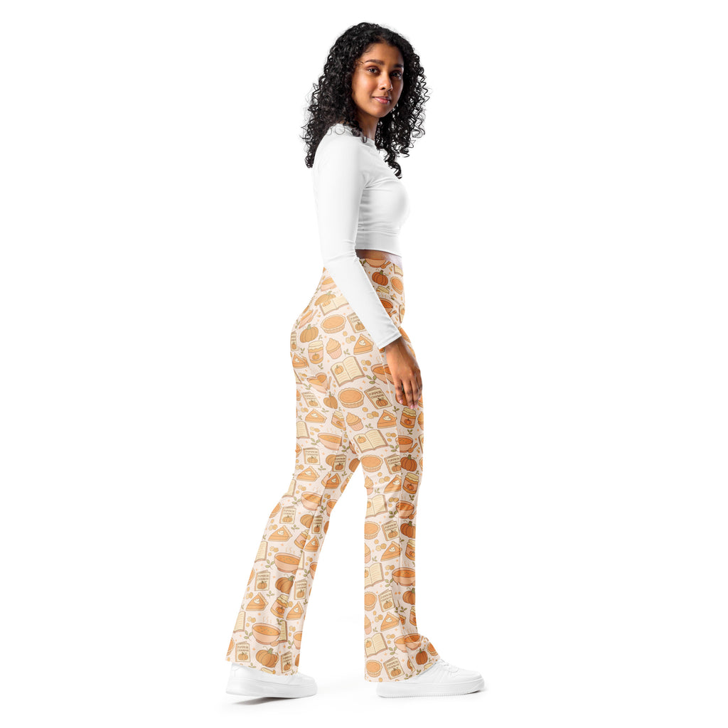 Women’s pumpkin pie themed high waist flare legging pants in warm beige and orange with pies jars and bread pattern