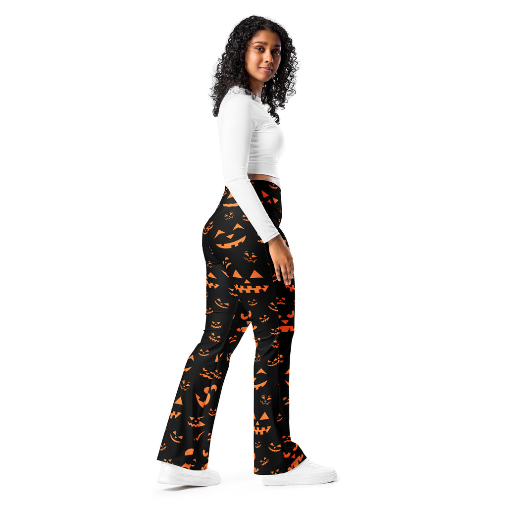 Women’s black halloween high waist flare pants with vibrant orange jack o lantern print for festive wear