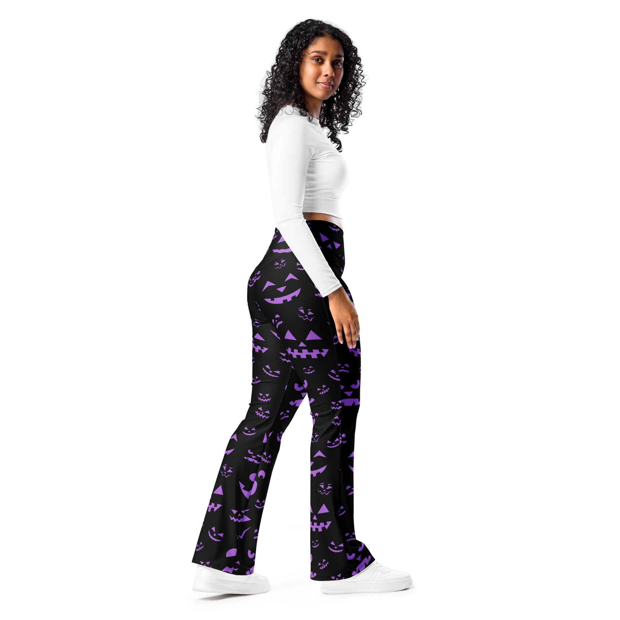 Women’s black flared pants with purple jack o lantern pattern high waist halloween flare leggings