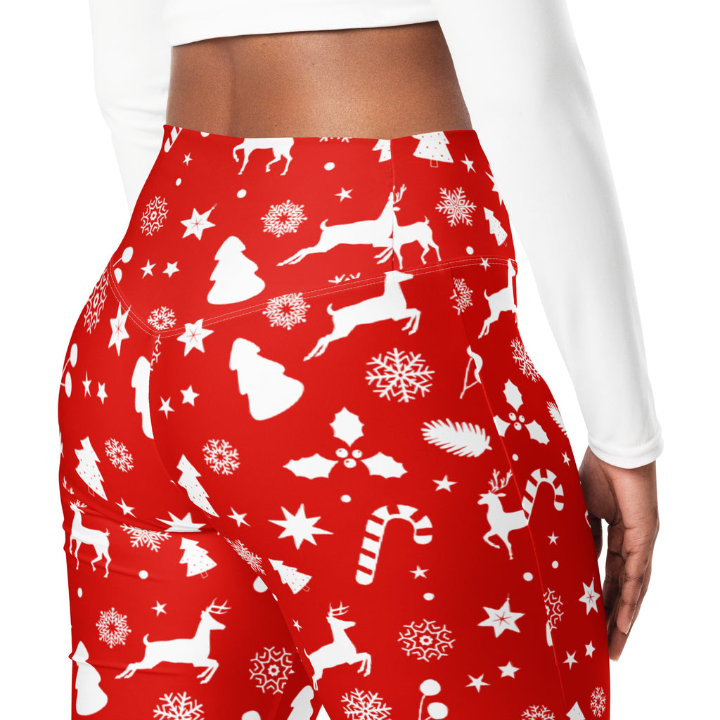 Women’s red christmas print high waist flare leggings with white reindeer snowflakes candy canes and holly patterns