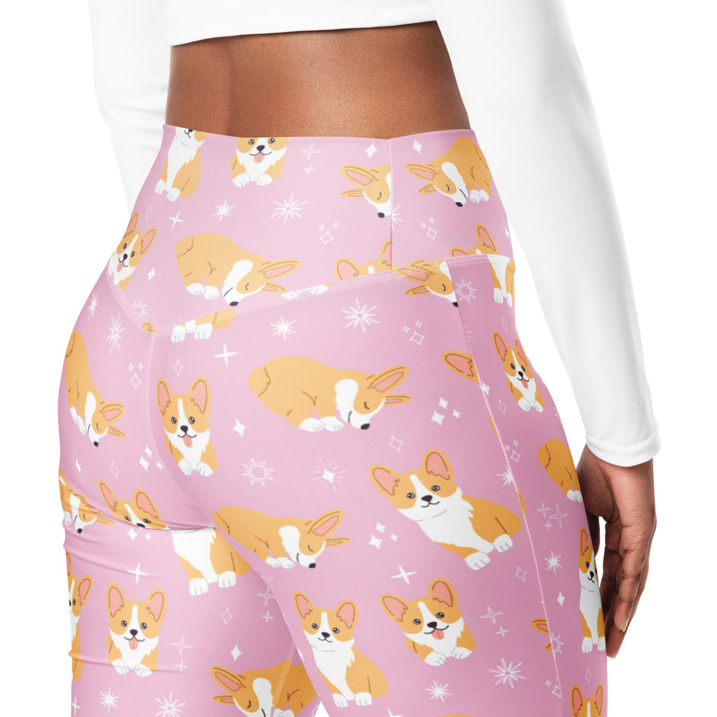 Women’s pink high waist flare leggings with orange and white corgi dog pattern and starburst accents