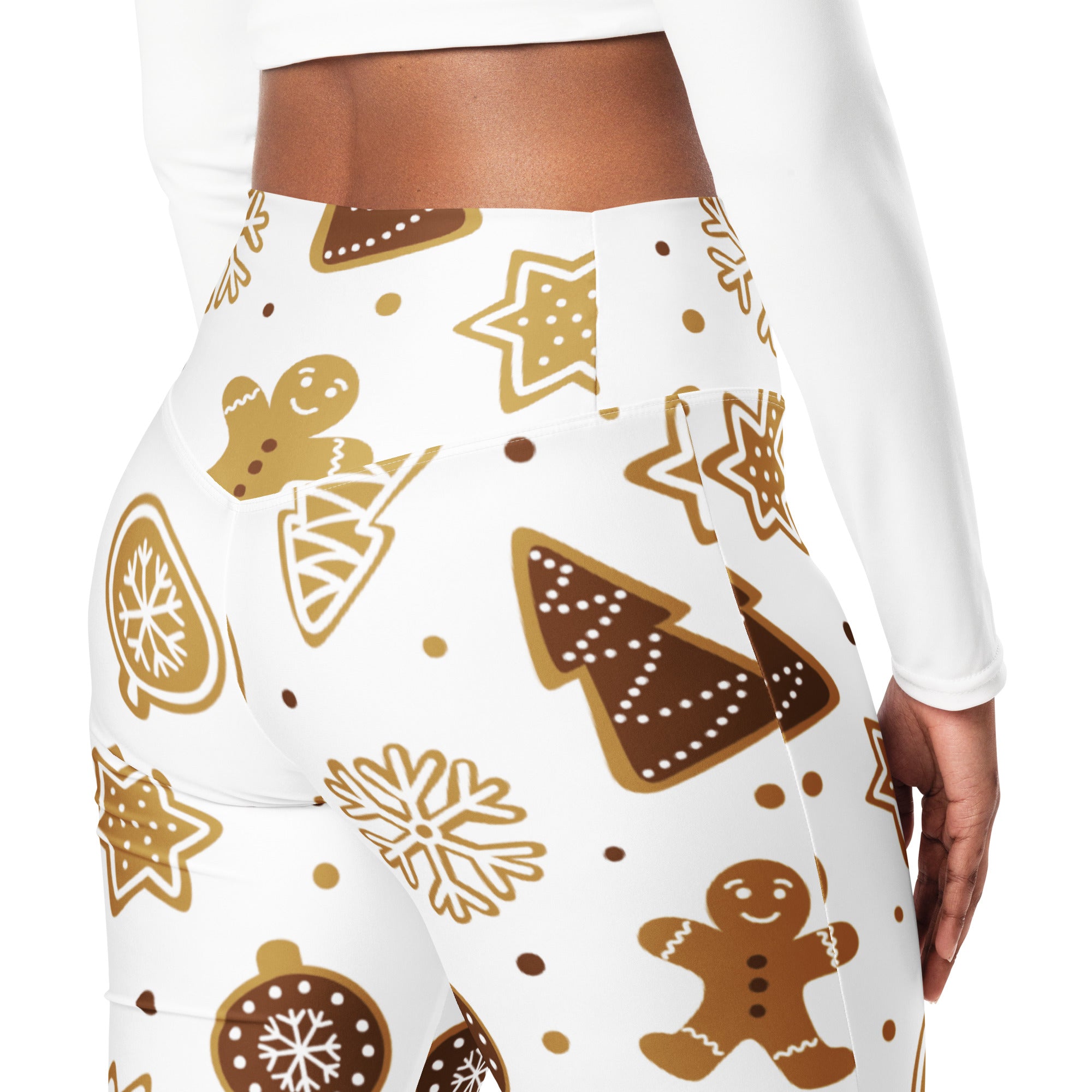 White high waist flare leggings with festive gingerbread cookie print in brown and gold for women