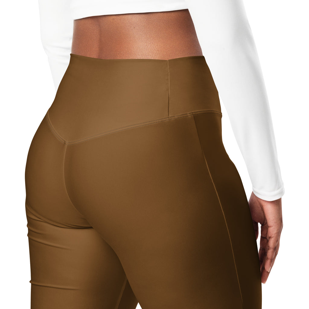 Women’s brown high waist flare legging pants with smooth form-fitting fabric and subtle seam detailing