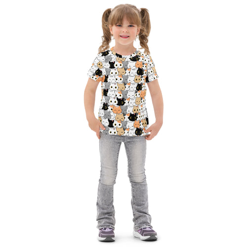 Girls cat face cotton t-shirt in white with short sleeves featuring a playful pattern of black gray and orange cartoon cats