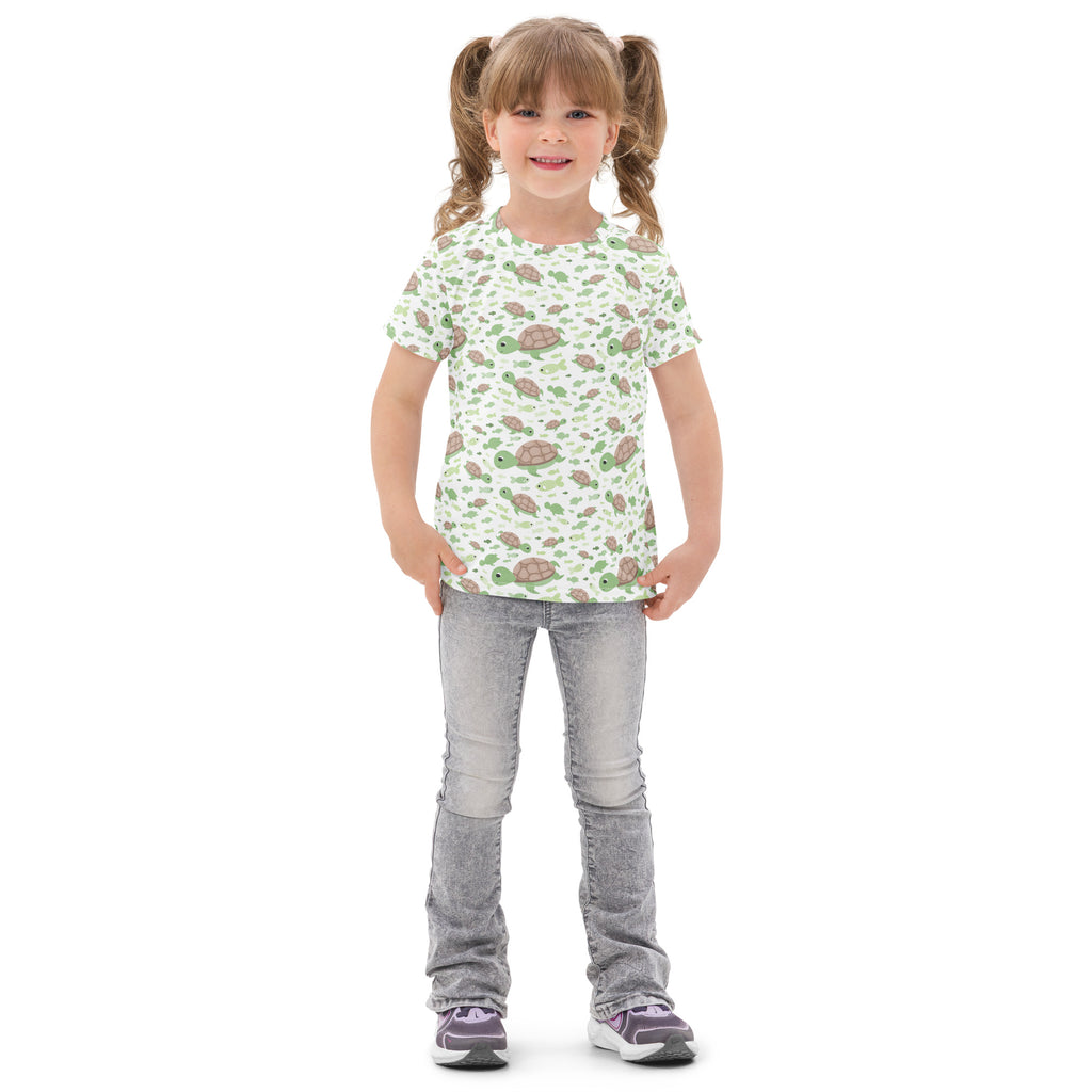 Kids green sea turtles cotton t-shirt with short sleeves and playful cartoon turtle pattern on a minty background