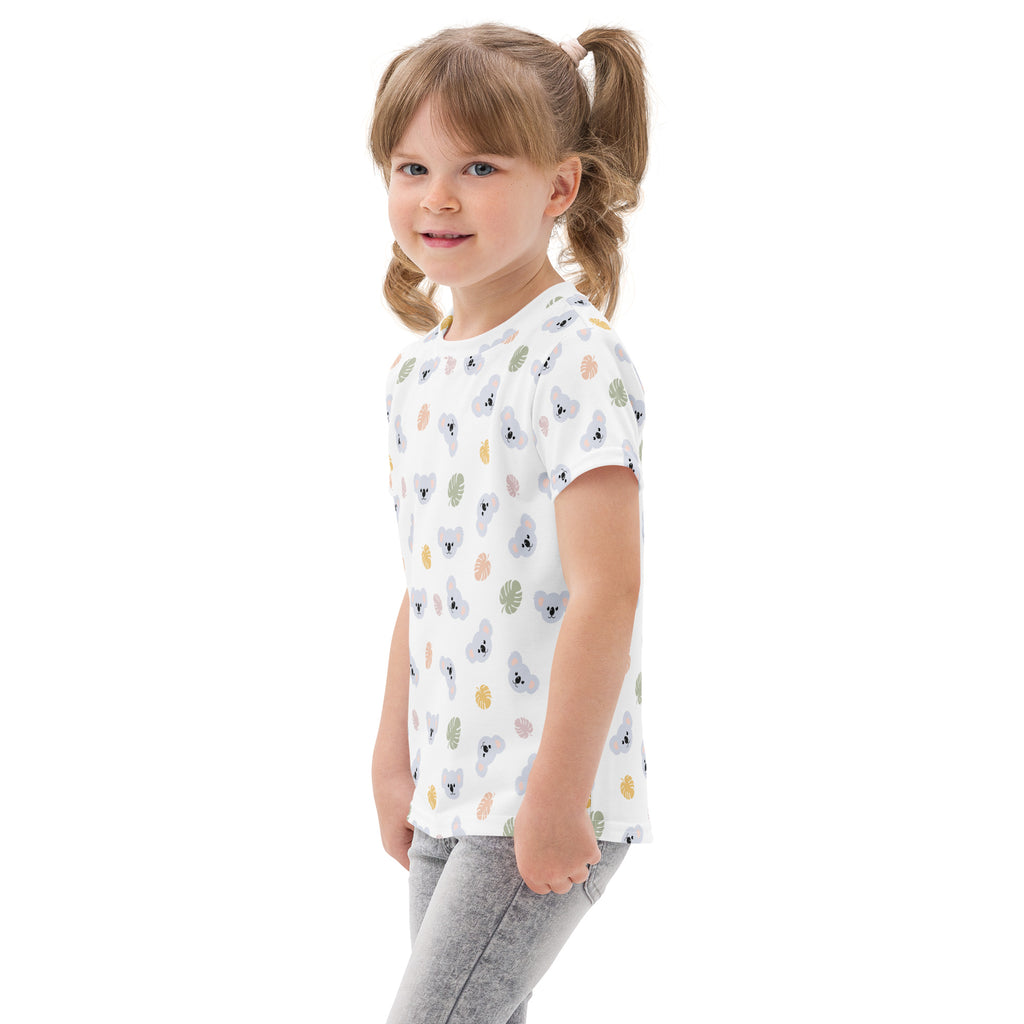 White kids koala cotton t-shirt with short sleeves featuring a playful koala and leaves pattern in soft pastels